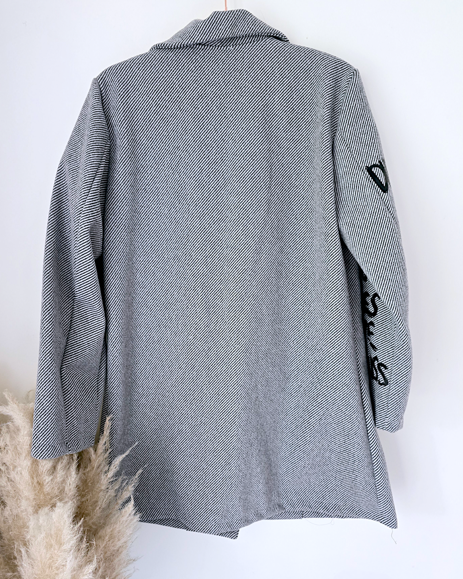 Manteau mi-saison à tag