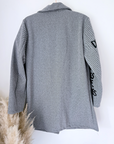 Manteau mi-saison à tag