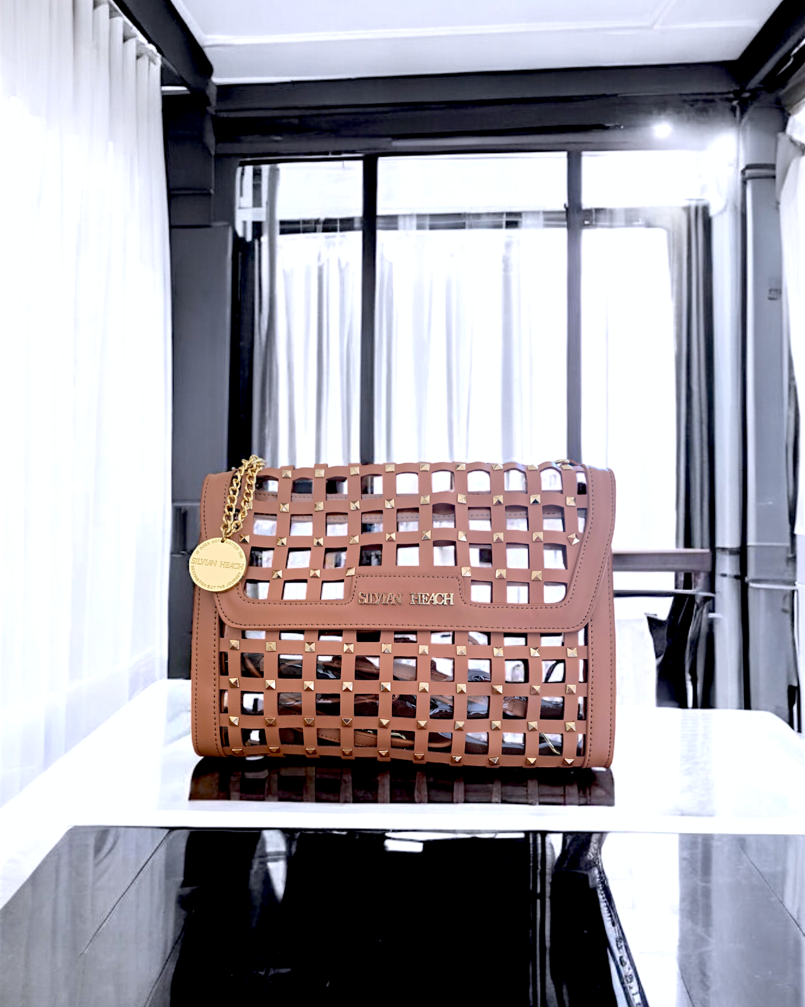 Sac pochette rock-chic