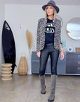Pantalon legging noir huilé