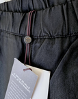 Pantalon legging noir huilé