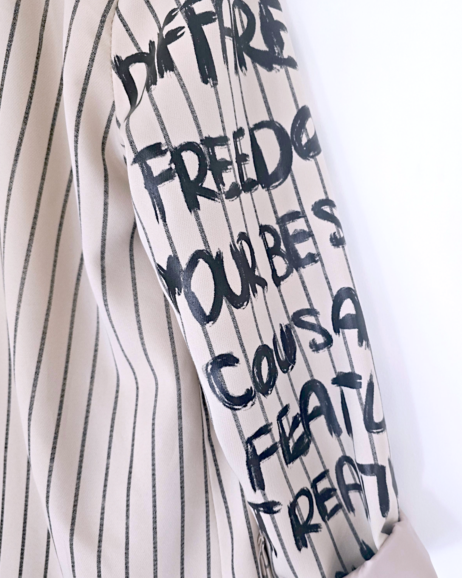 Veste boy à rayures et tags