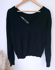 Pull noir à éclair