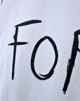 Tee-shirt blanc à tags