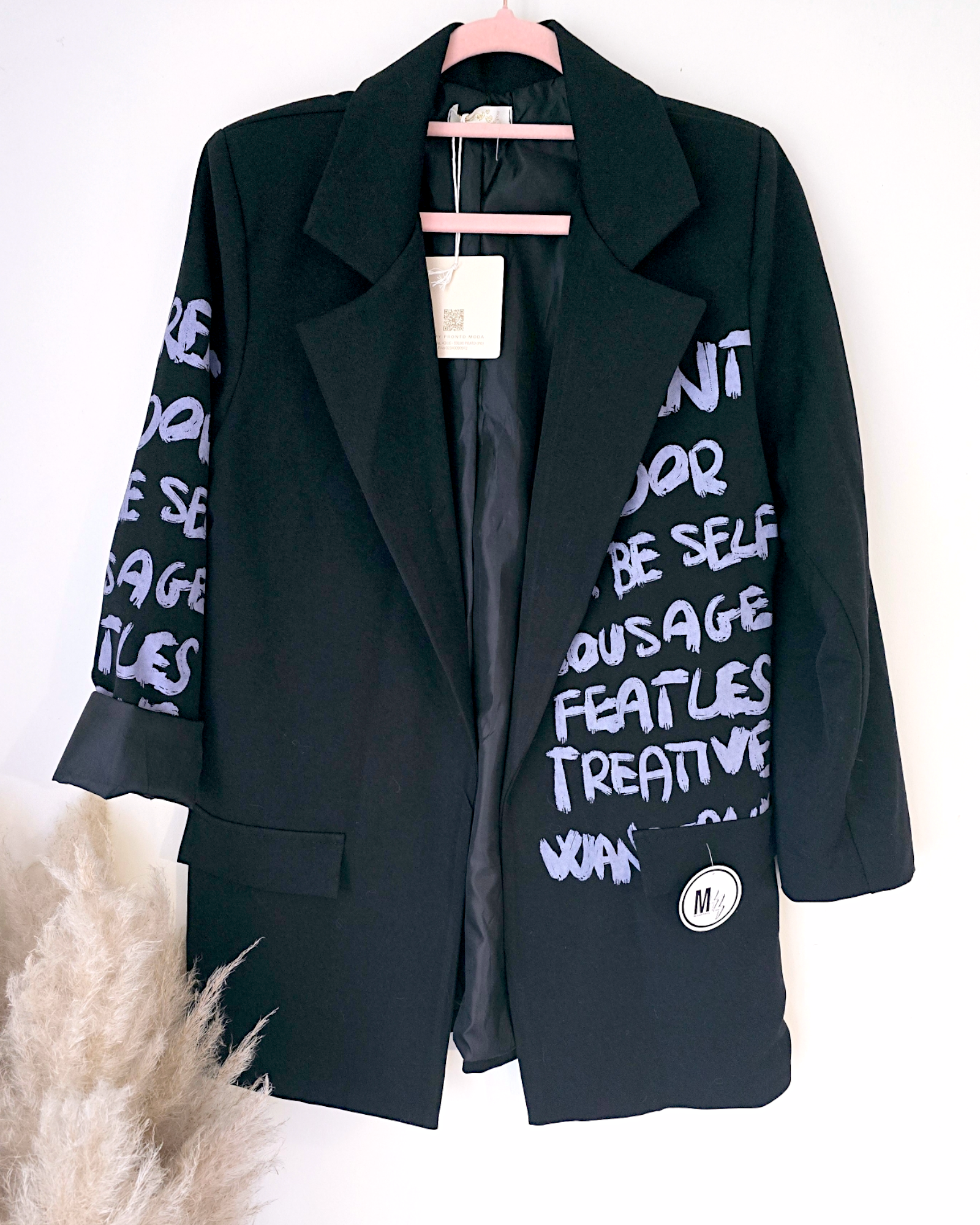 Veste noire à tags parmes