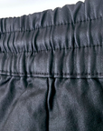 Jogg noir huilé