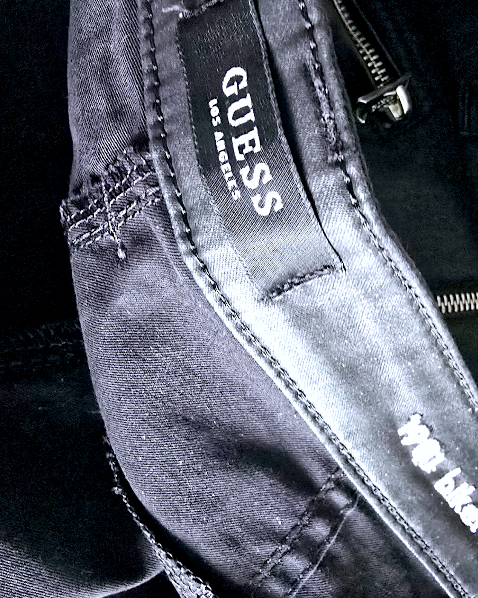 Pantalon noir huilé
