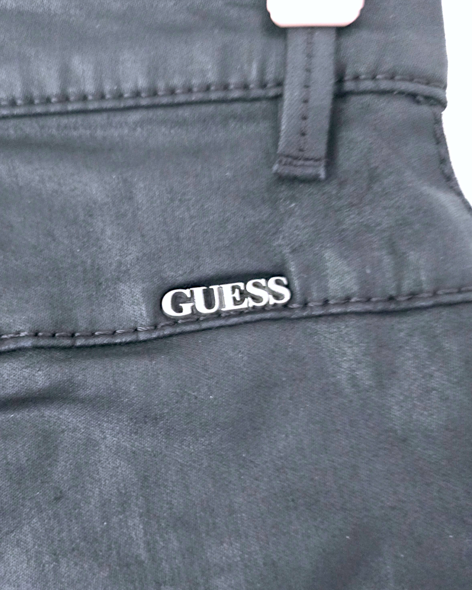 Pantalon noir huilé