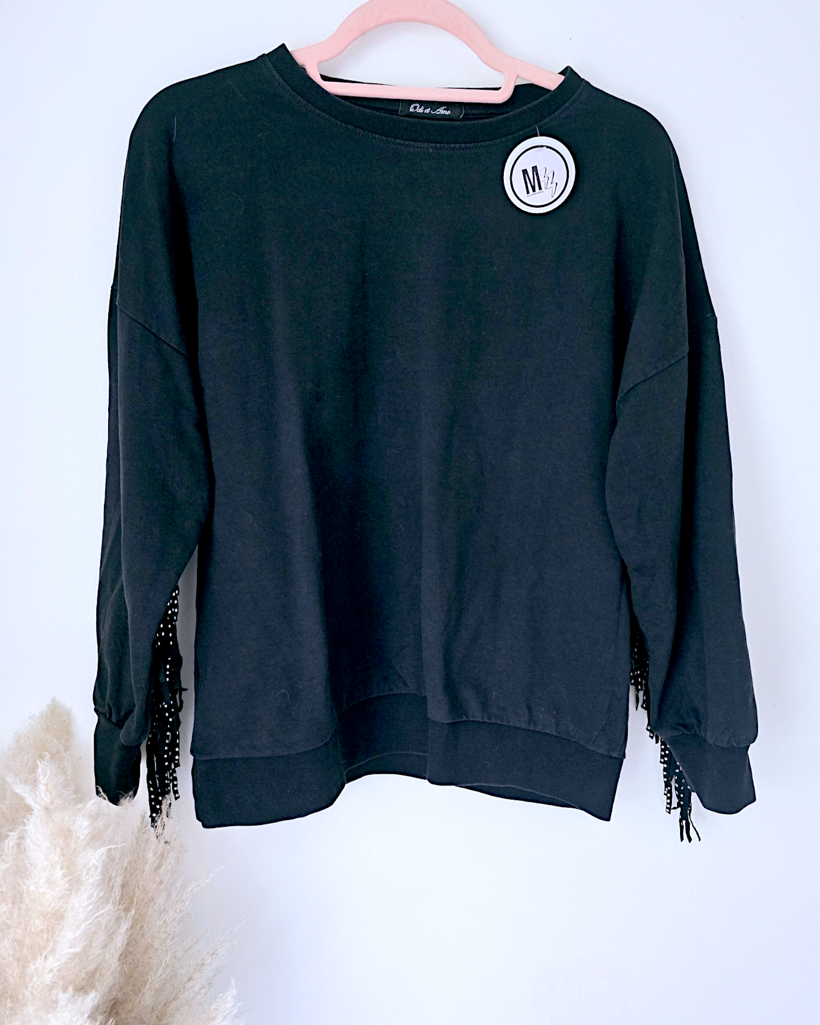 Sweat noir à franges