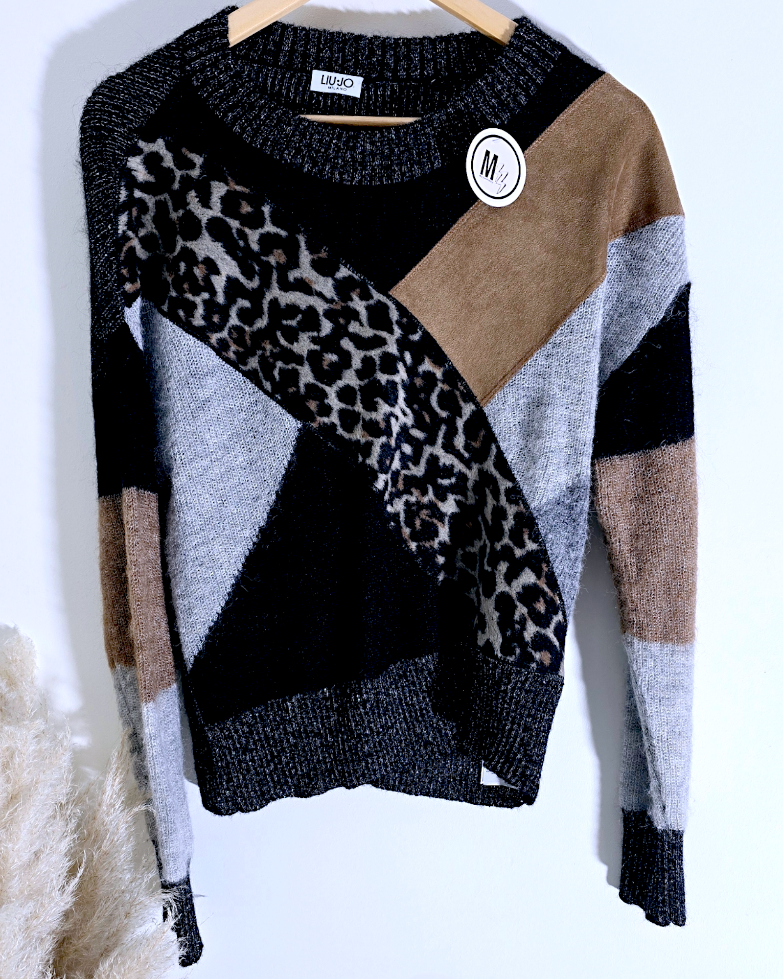 Pull chic léo