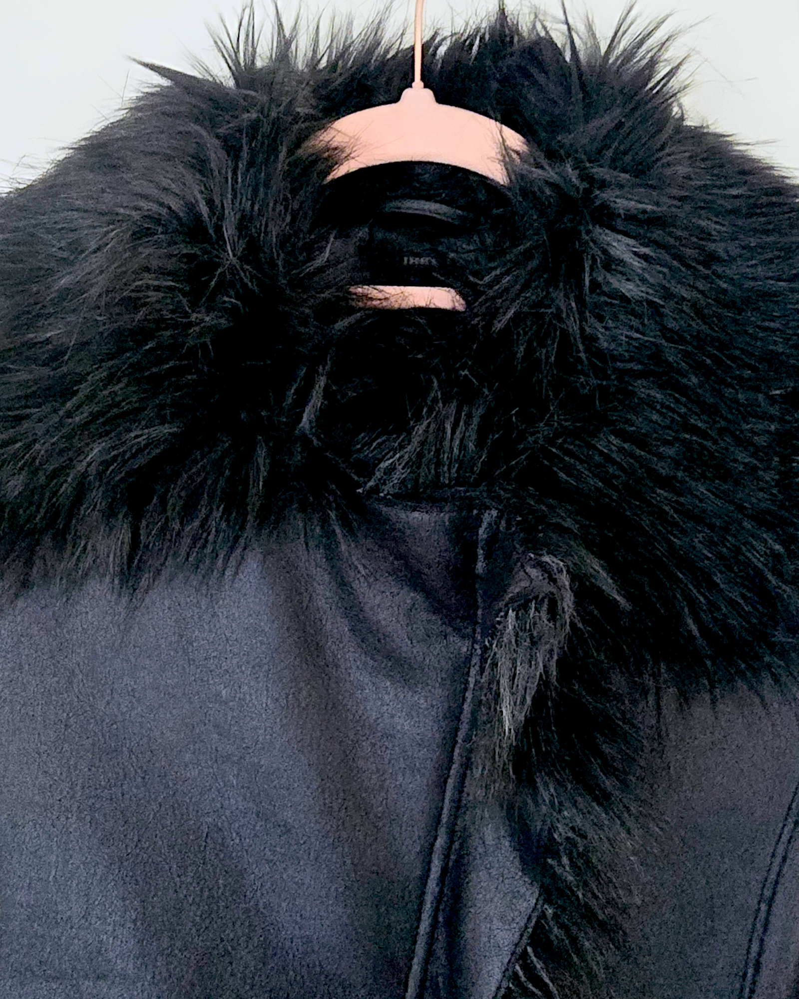 Manteau fausse fourrure
