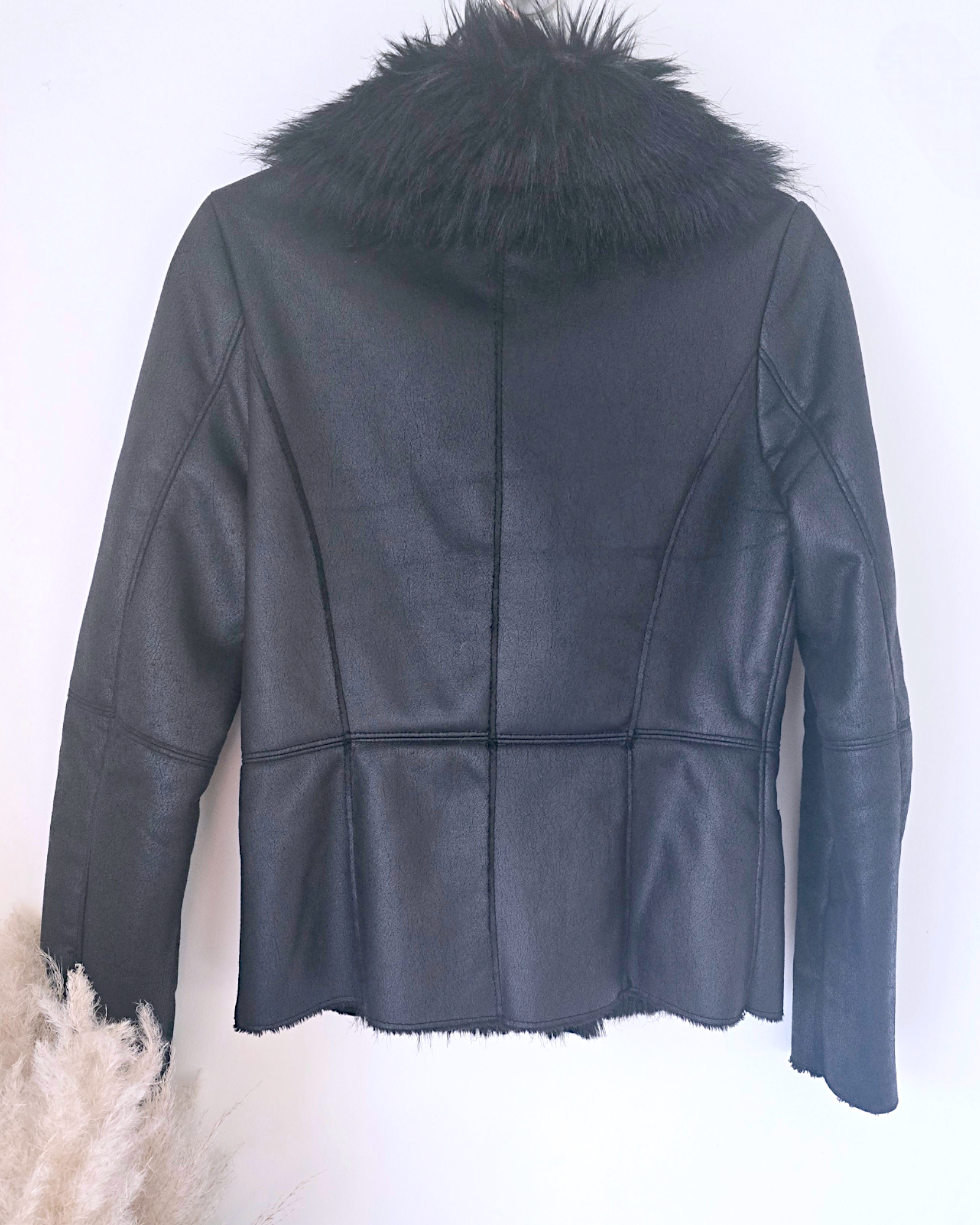 Manteau fausse fourrure
