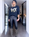 Pantalon legging noir huilé