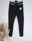 Pantalon slim noir huilé