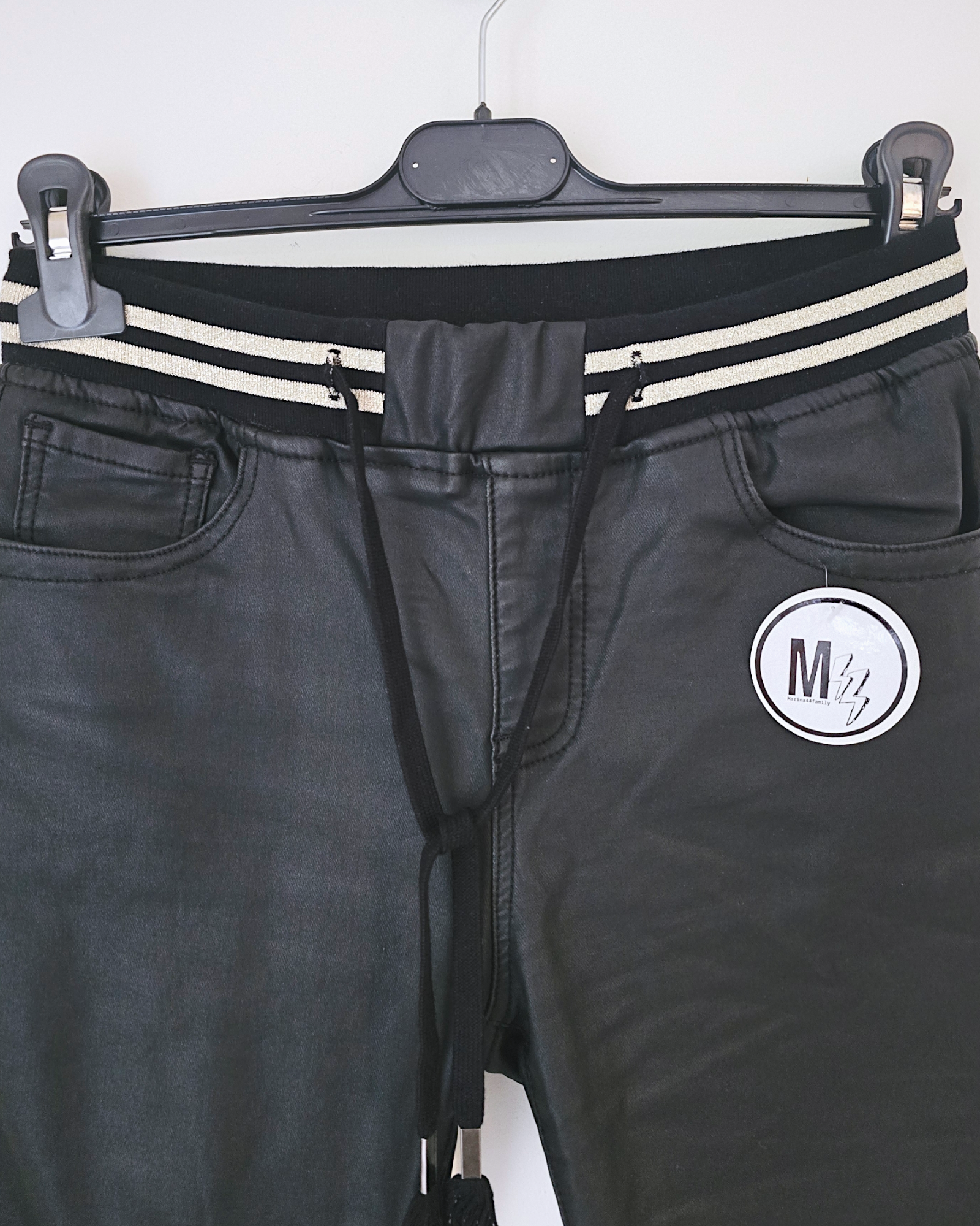 Pantalon slim noir huilé