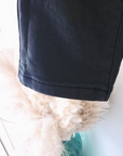 Pantalon slim noir huilé