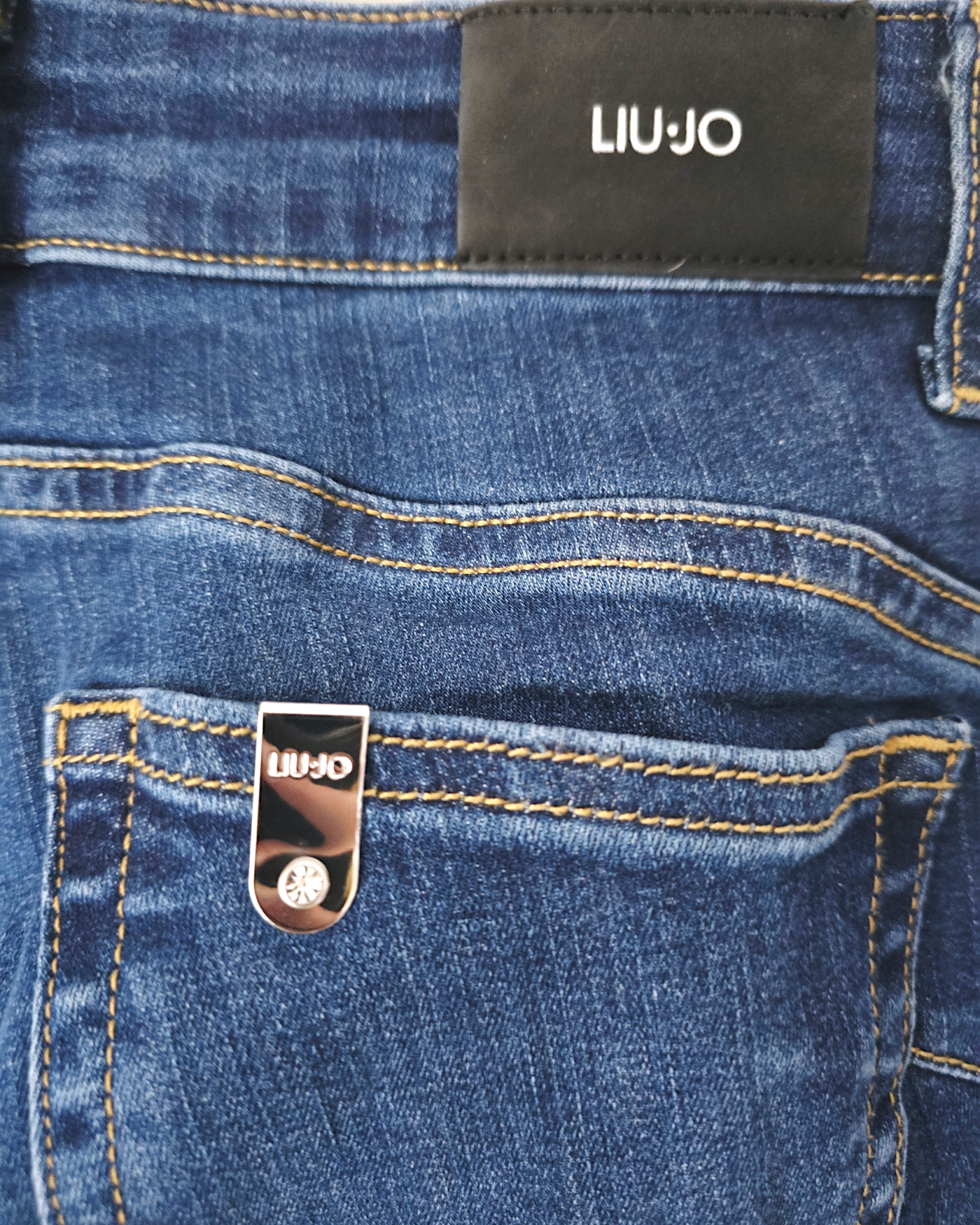 Jean bleu slim clouté