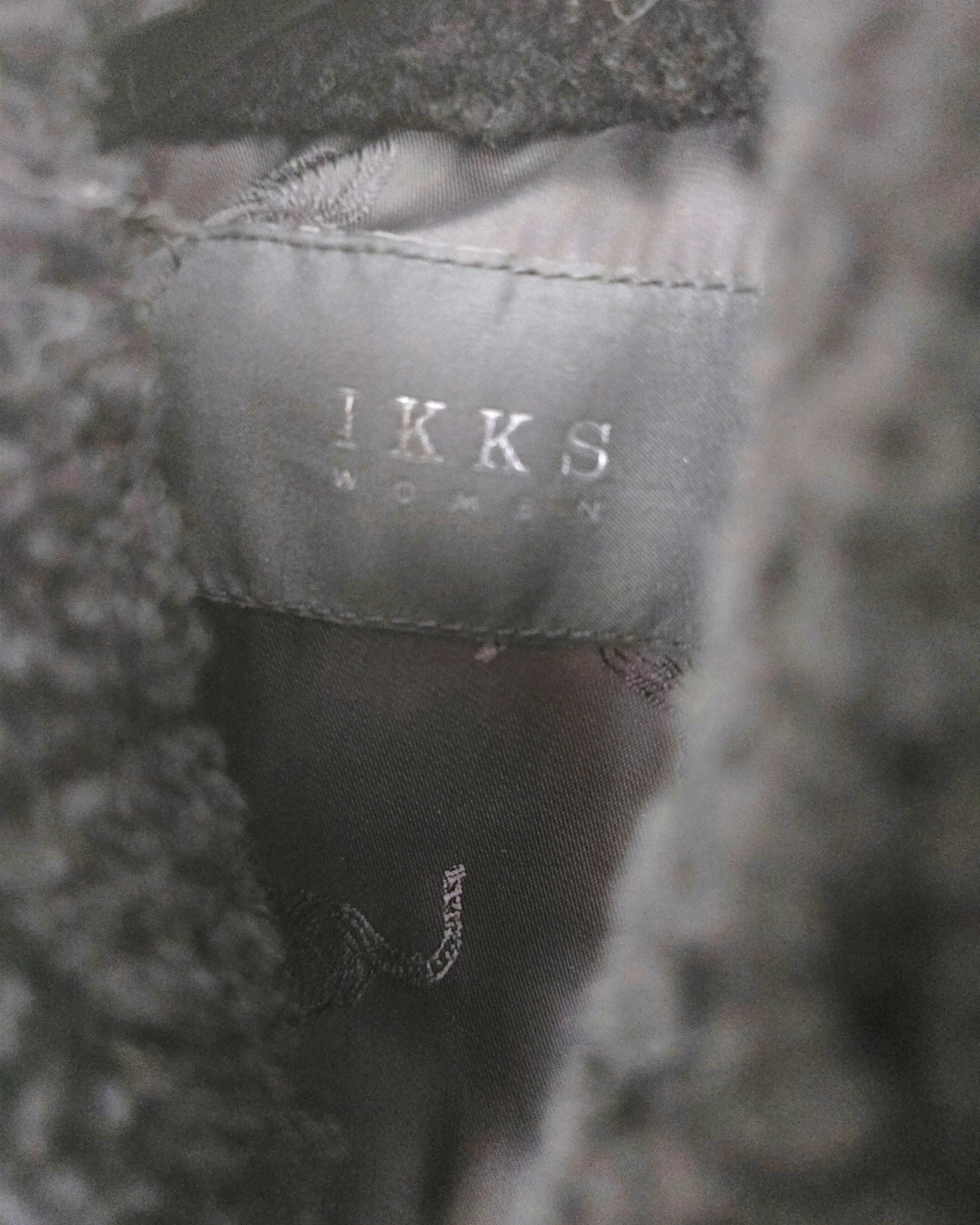 Manteau teddy noir manches cuir et peau retournée