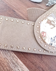 Ceinture élastique beige à boucle dorée