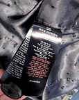 Veste cintrée camouflage à fibres métallisées dorées