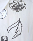 Chemise blanche à perles bijoux