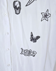 Chemise blanche à perles bijoux