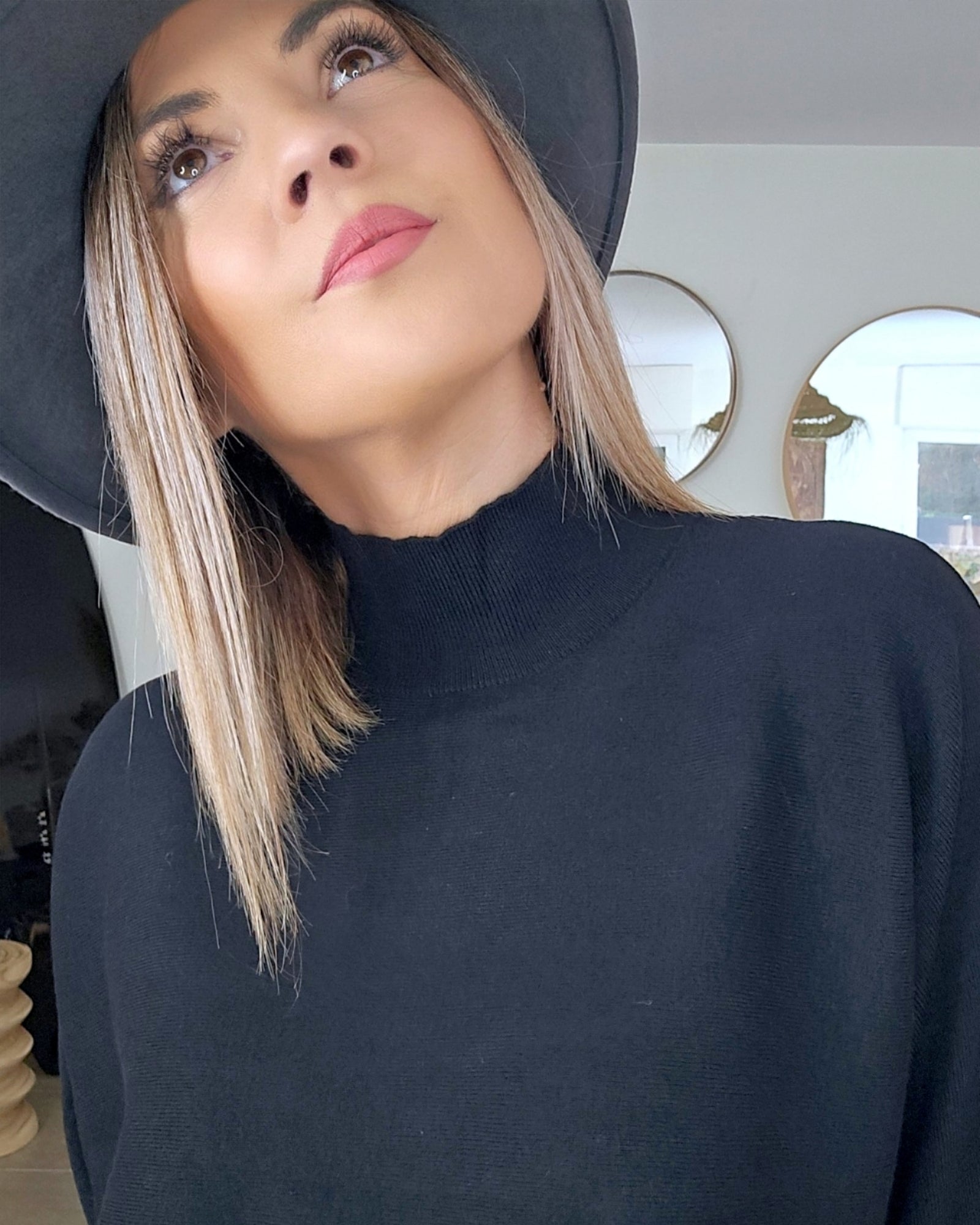 Pull noir col cheminé