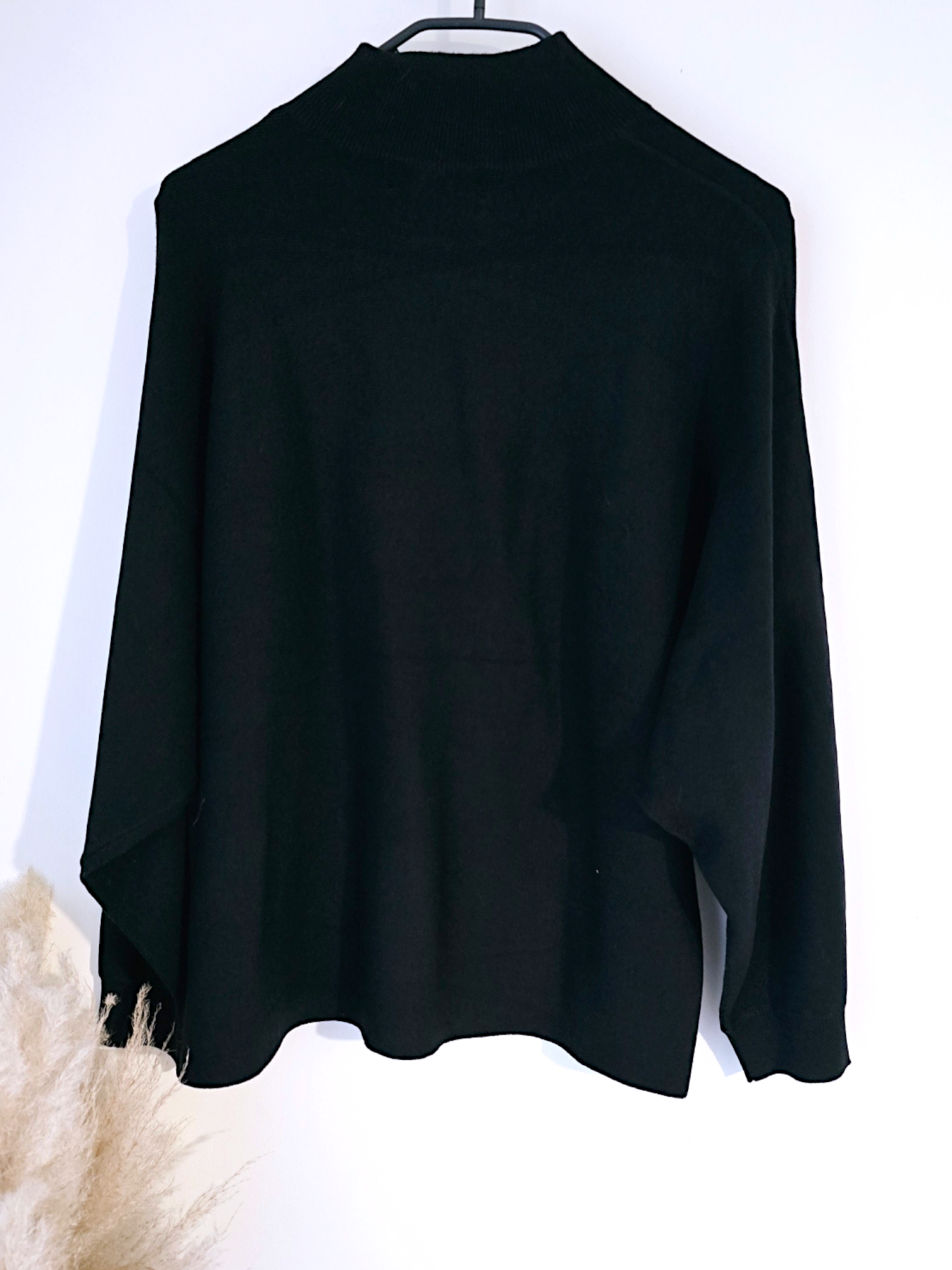 Pull noir col cheminé