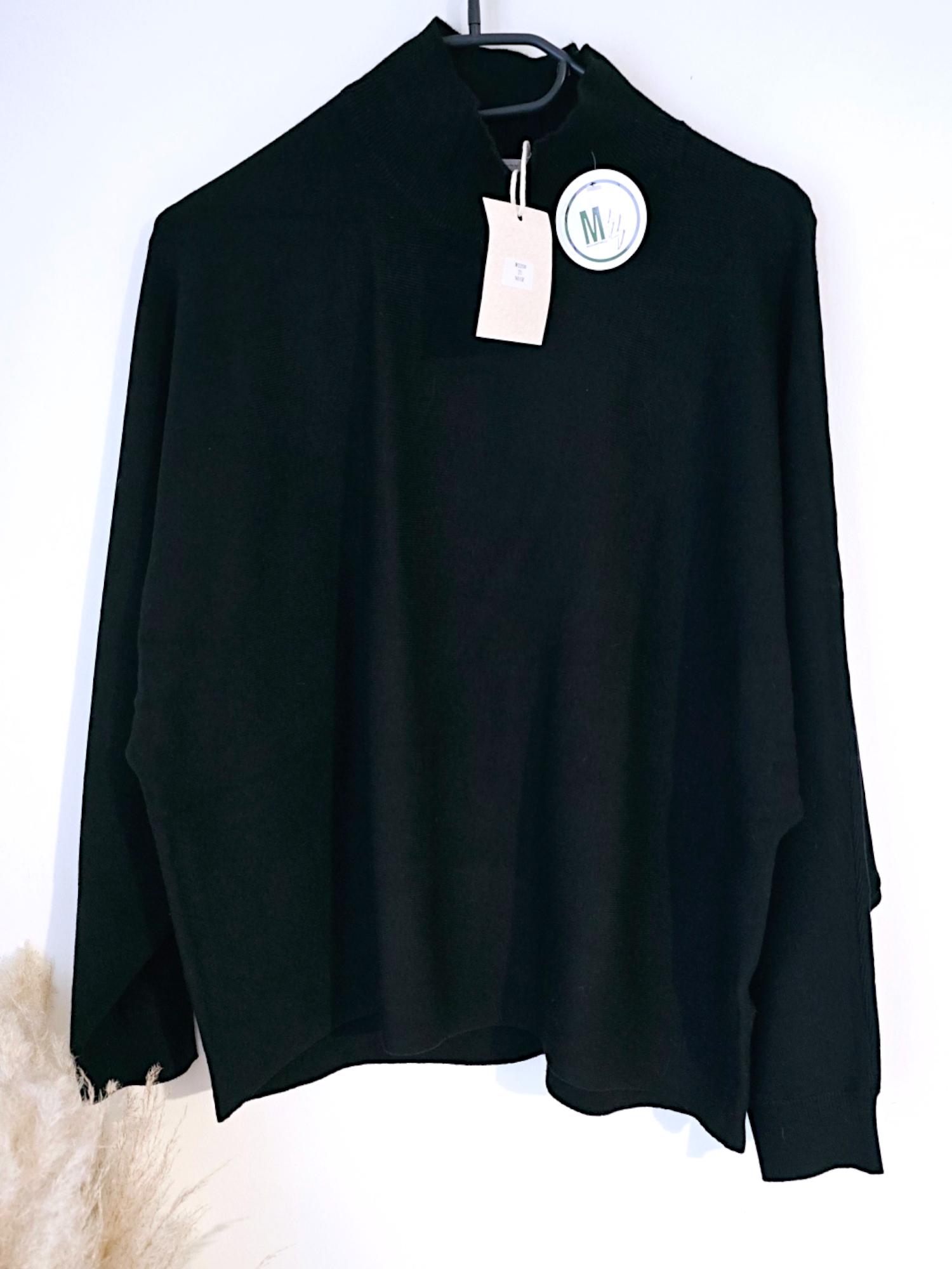 Pull noir col cheminé