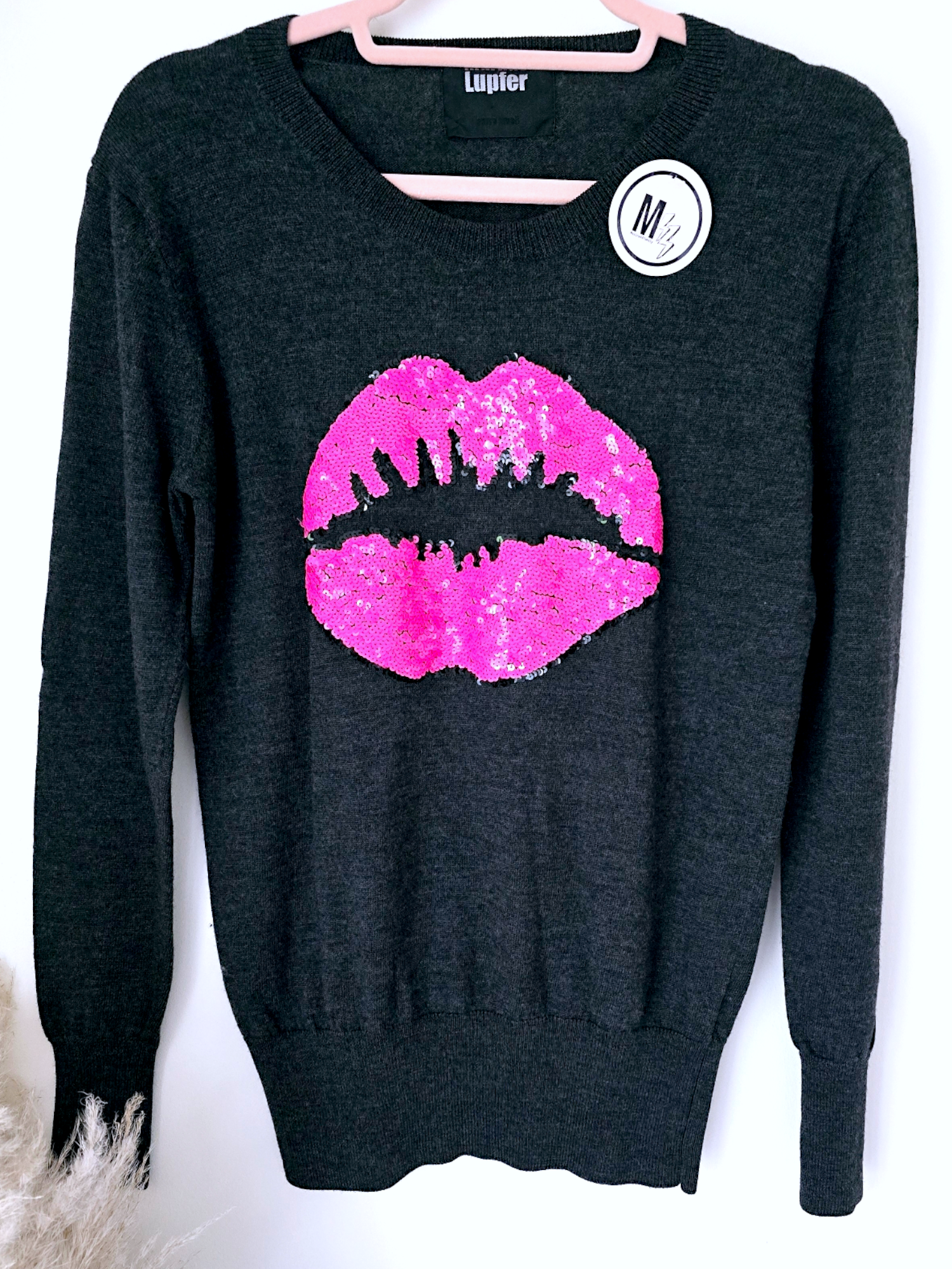 Pull bouche rose fluo