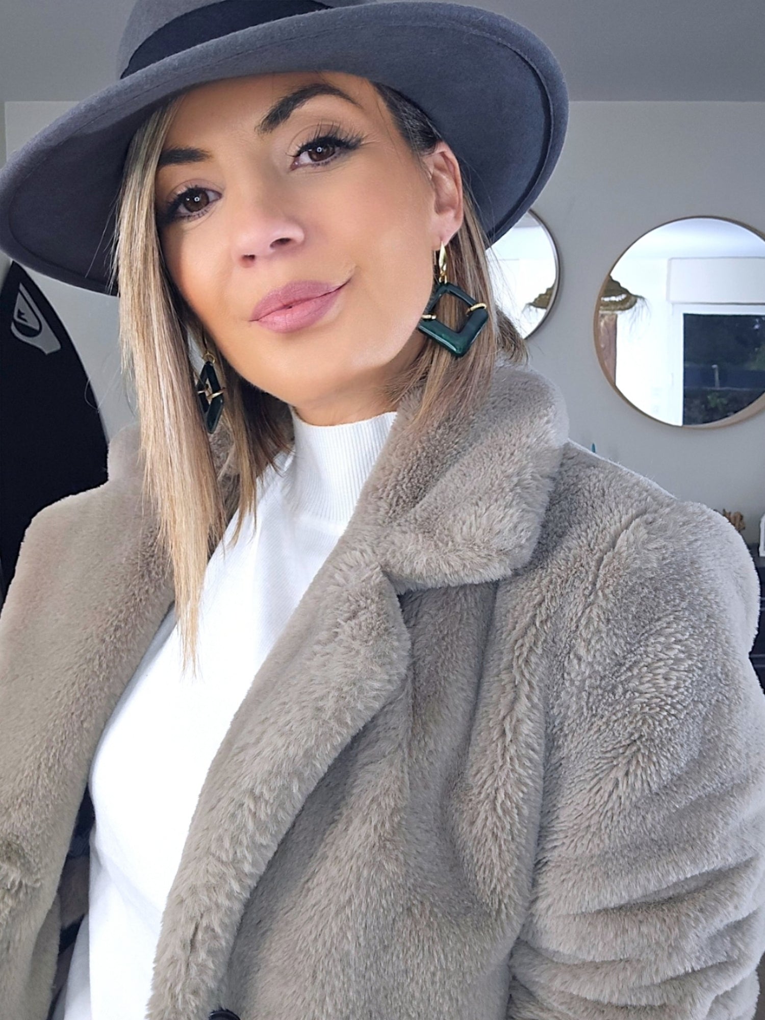 Manteau fausse fourrure