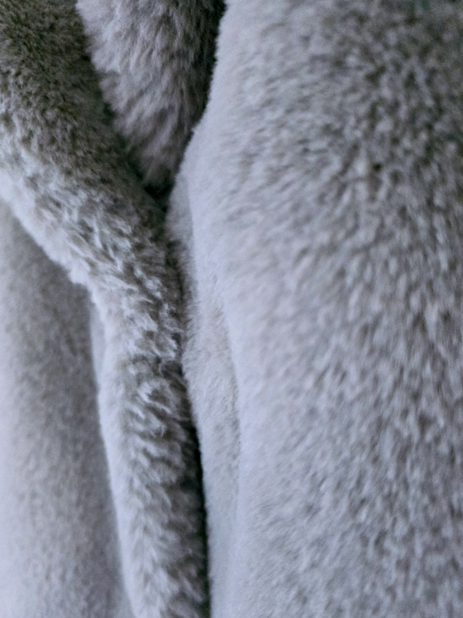 Manteau fausse fourrure