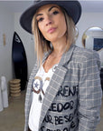 Veste boy à carreaux et tags