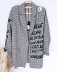 Veste boy à carreaux et tags