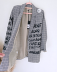 Veste boy à carreaux et tags