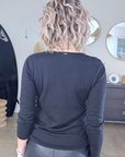 Pull black militaire