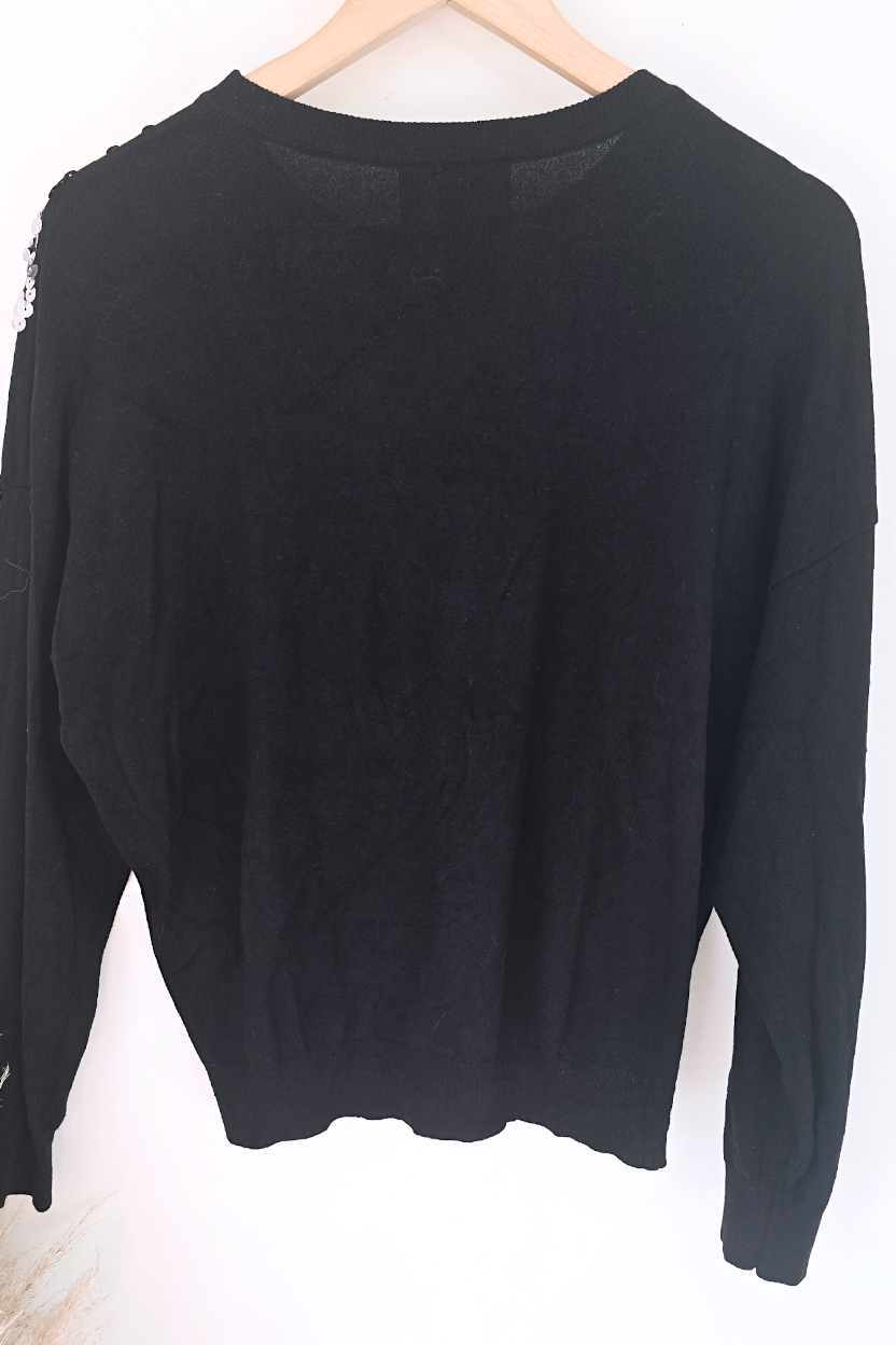 Pull noir éclairs sequins