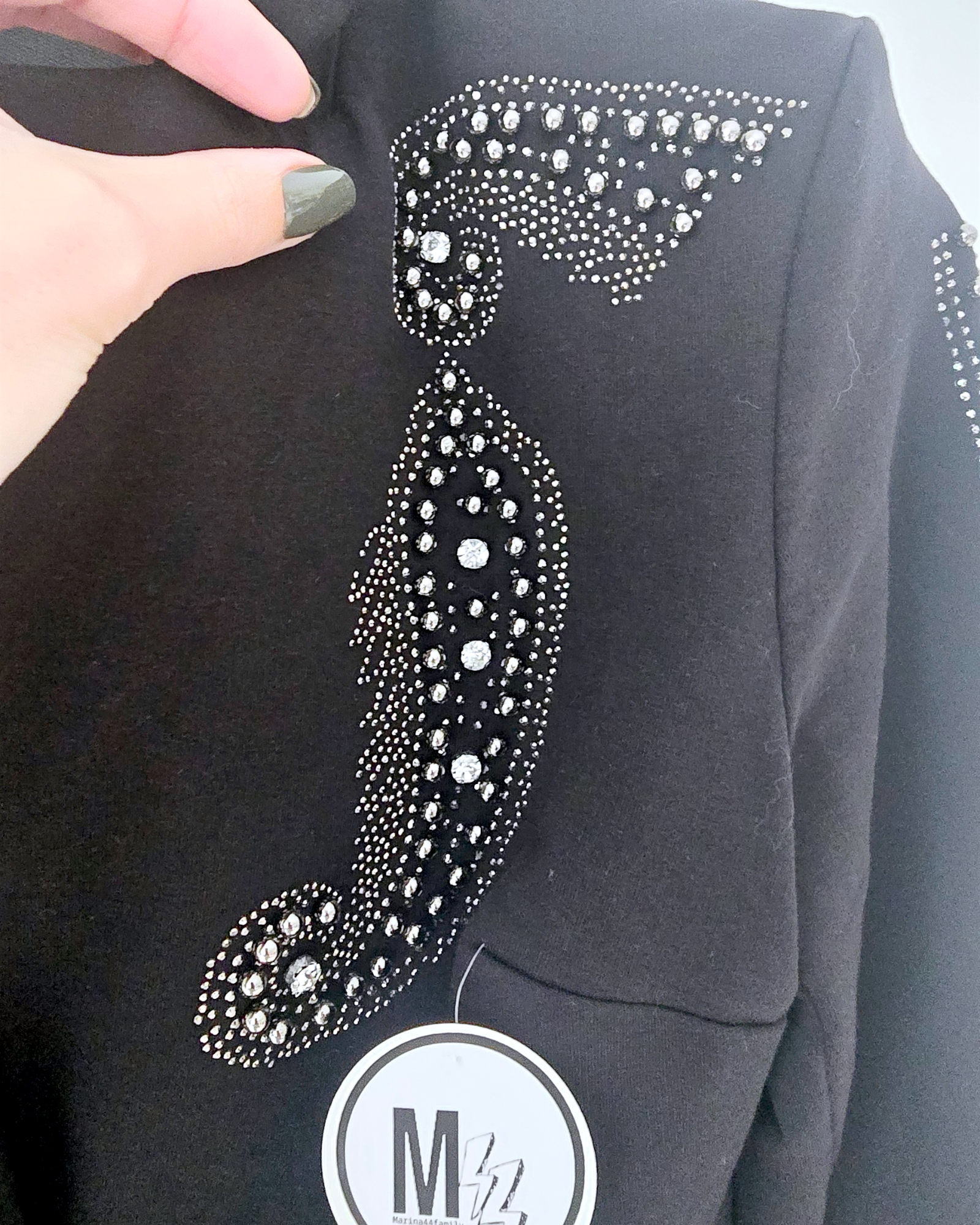 Veste cintrée noire cloutée