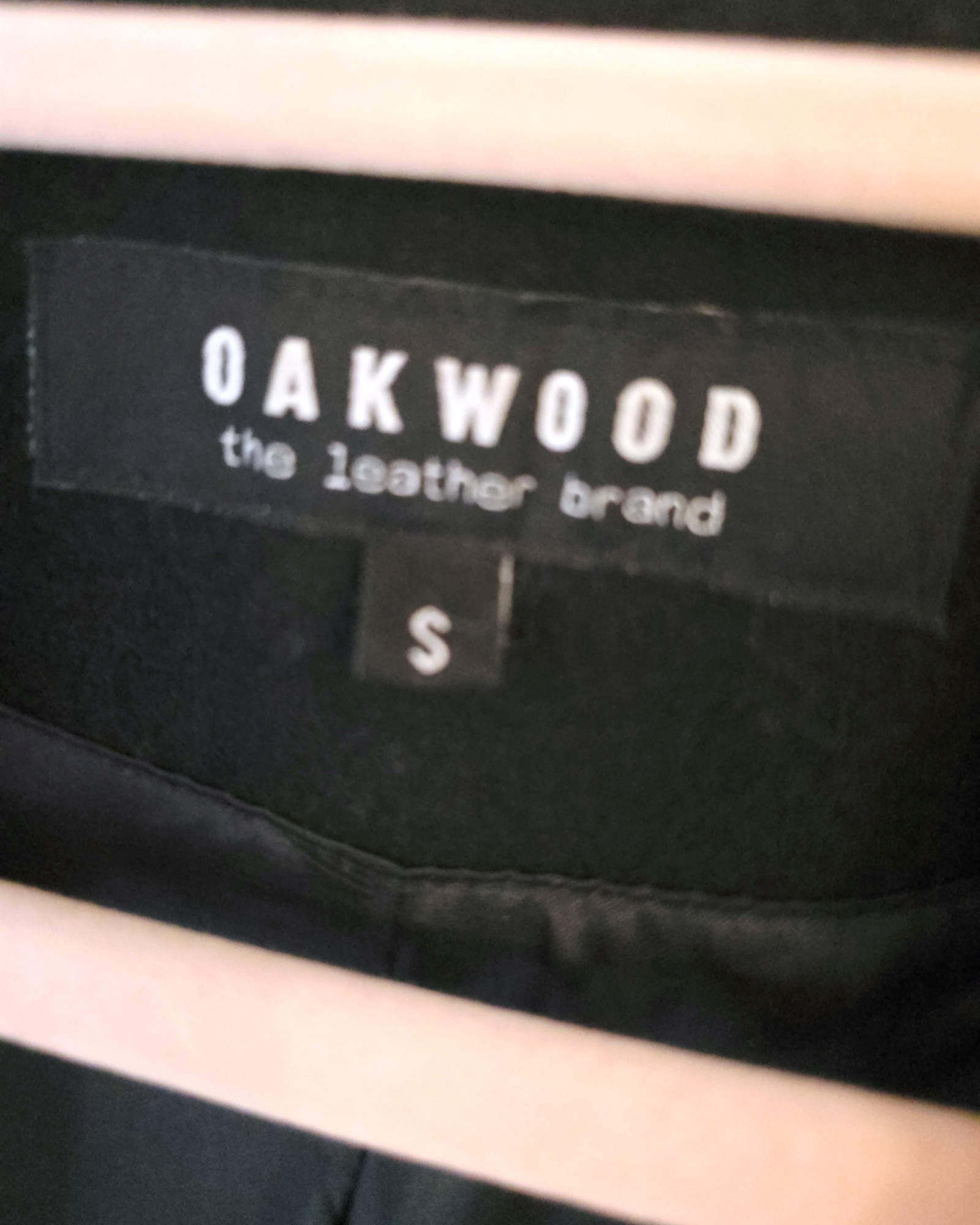 Veste noire bi-matière laine et cuir