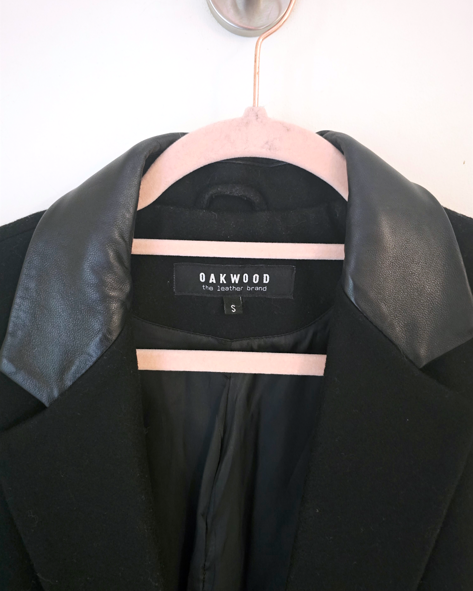 Veste noire bi-matière laine et cuir