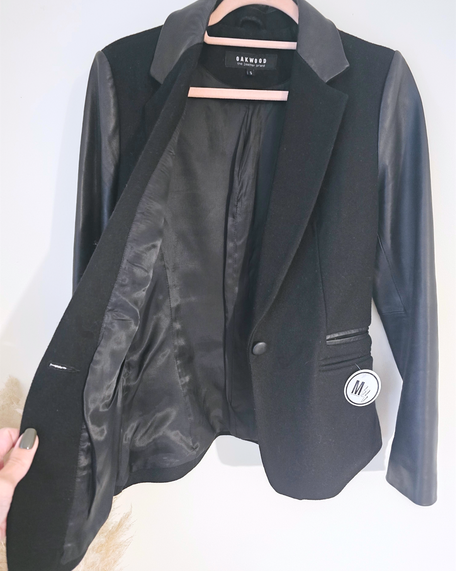 Veste noire bi-matière laine et cuir