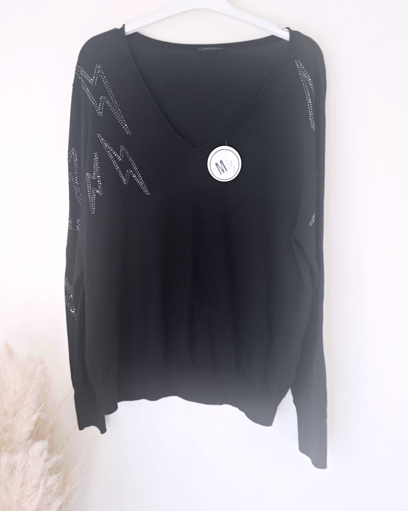 Pull noir éclairs strass