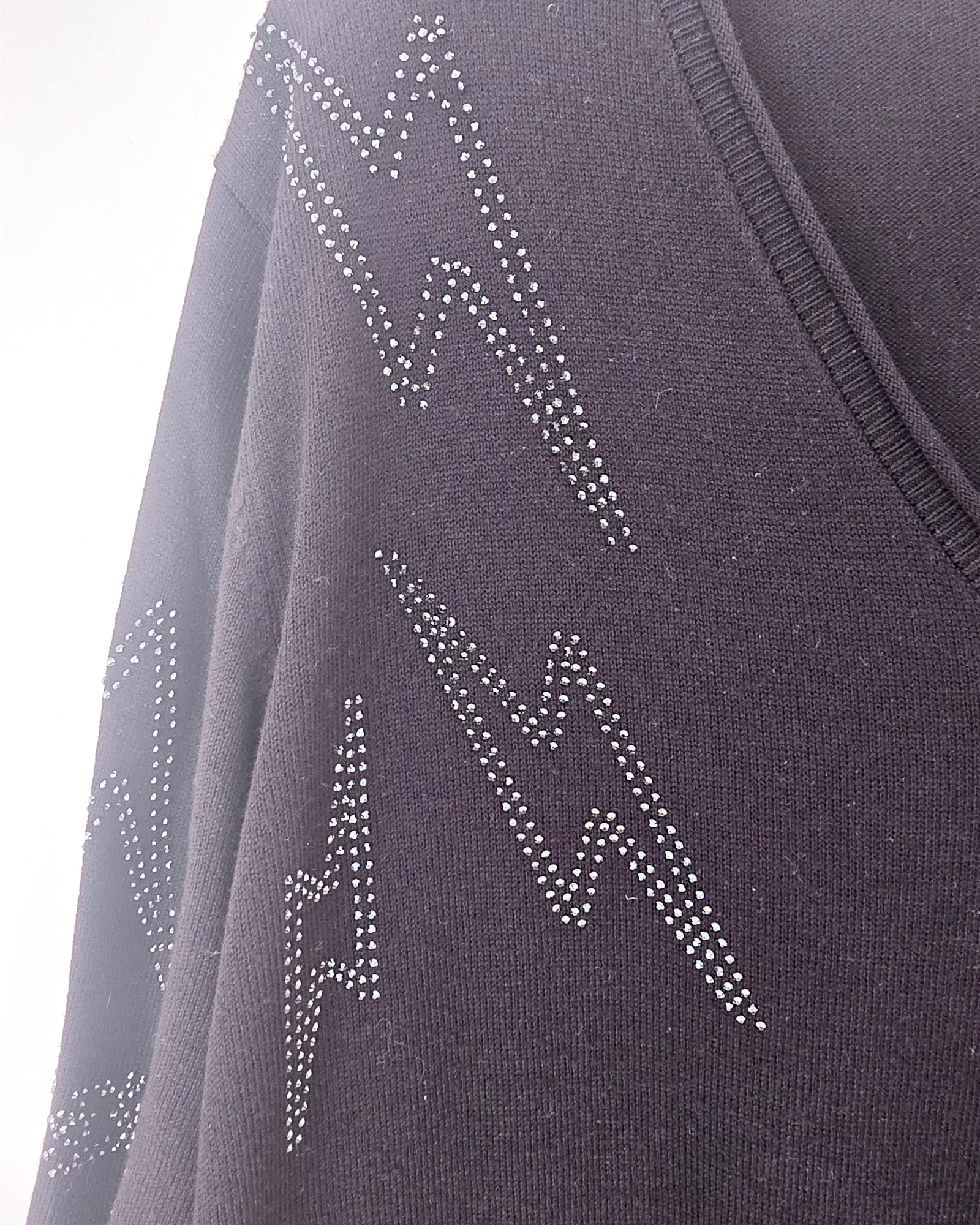 Pull noir éclairs strass