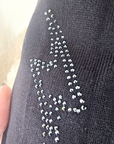 Pull noir éclairs strass