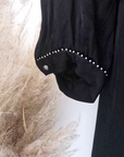 Robe noire skull en relief