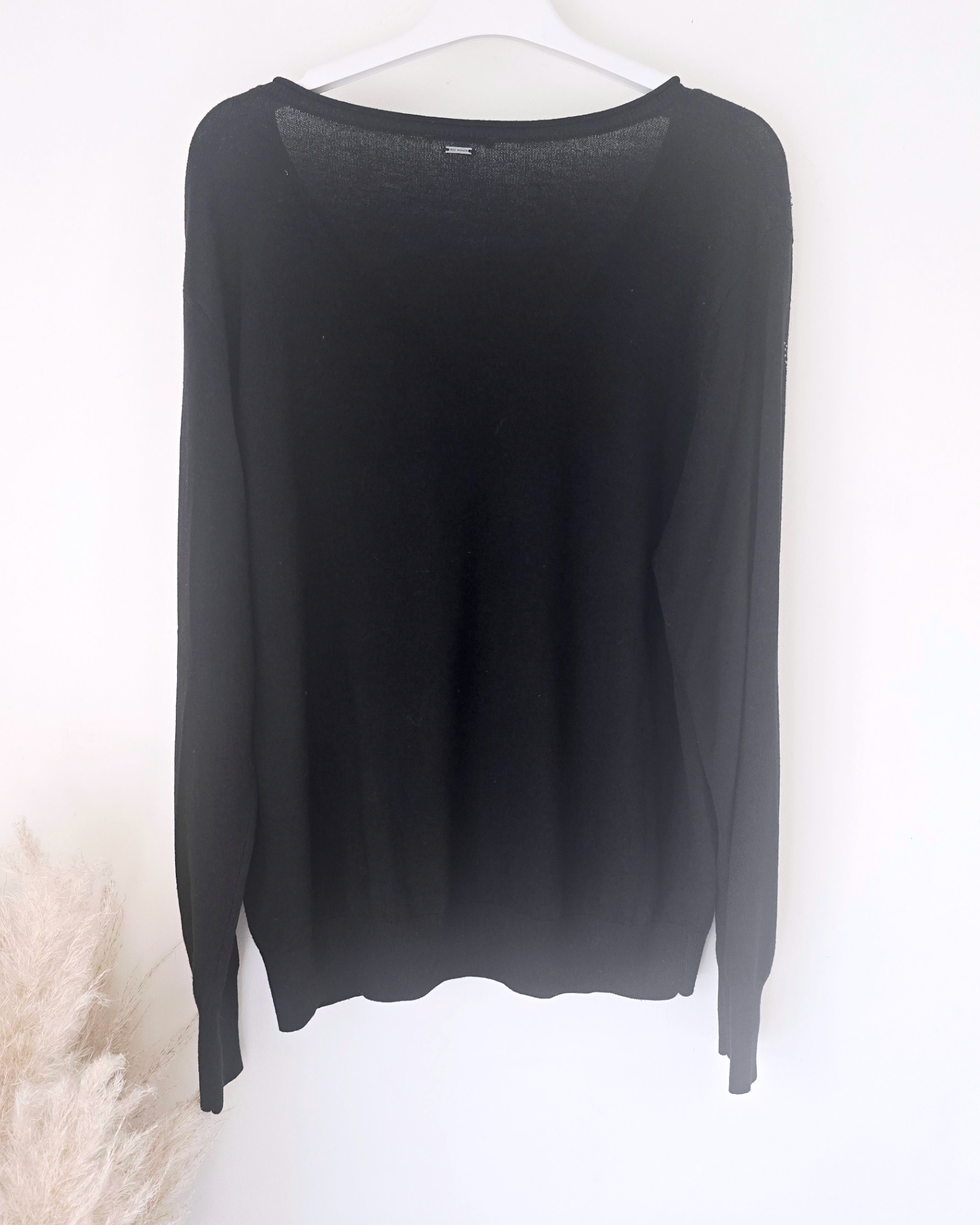 Pull noir éclairs strass