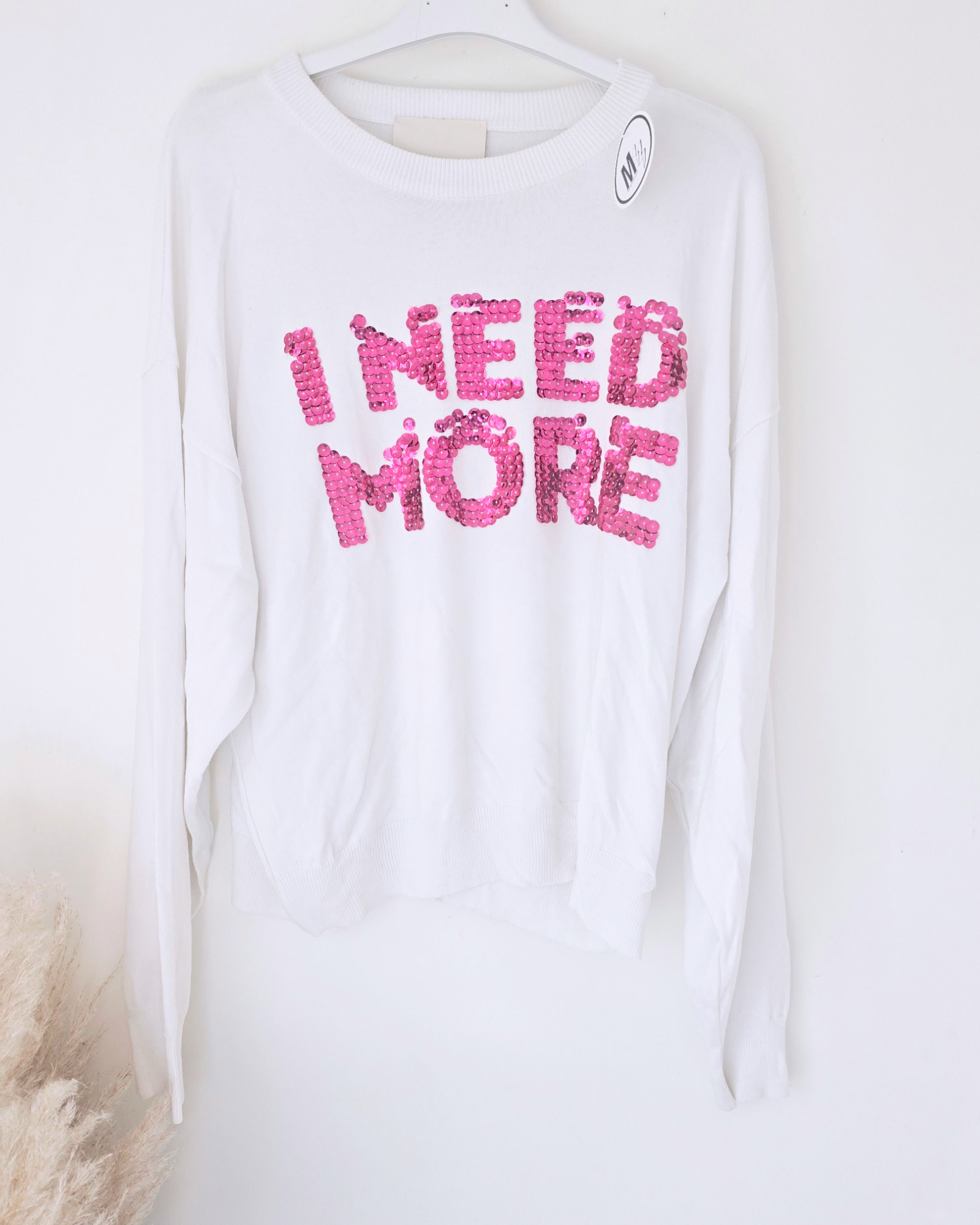 Pull blanc à sequins fuchsia