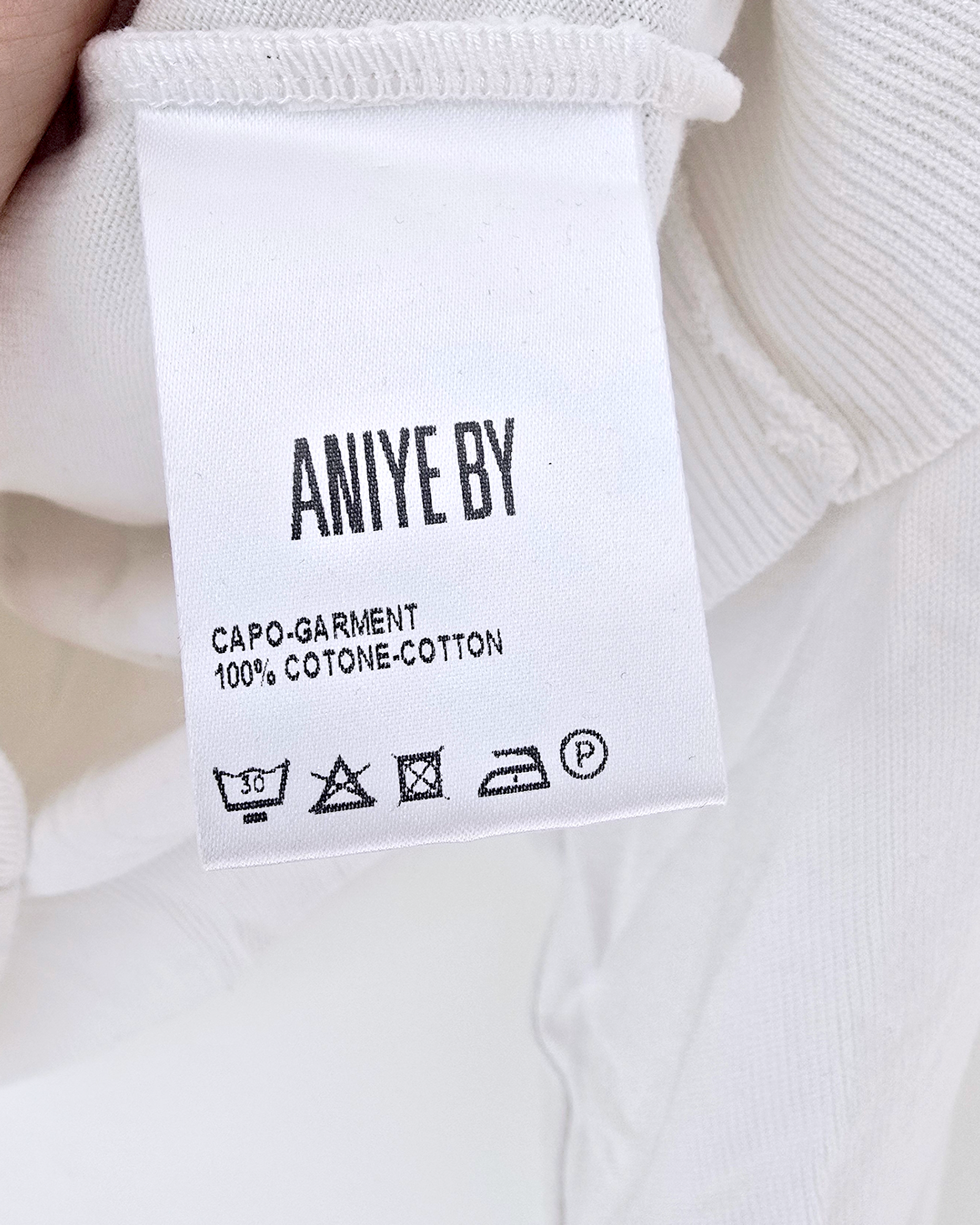 Pull blanc à sequins fuchsia