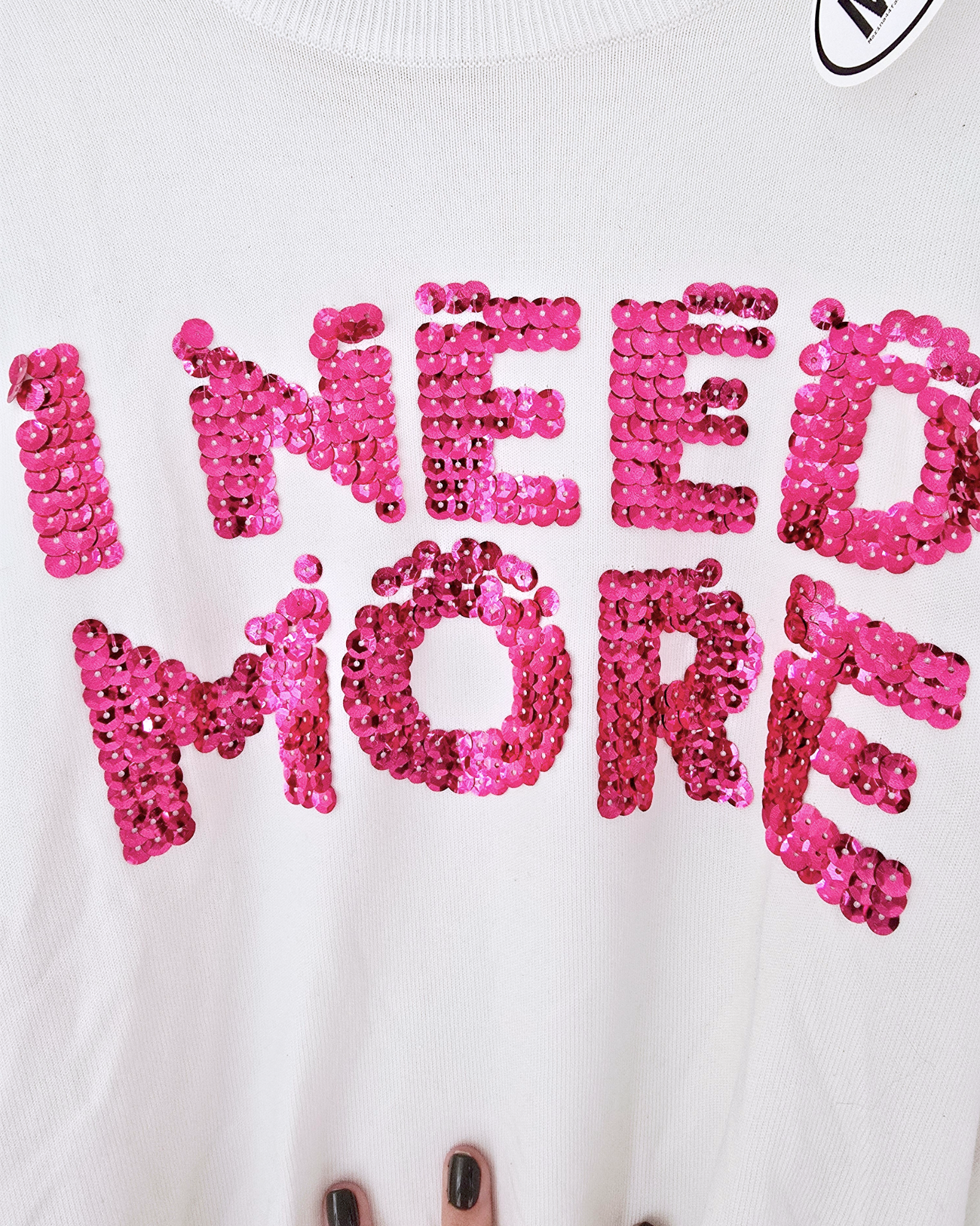 Pull blanc à sequins fuchsia