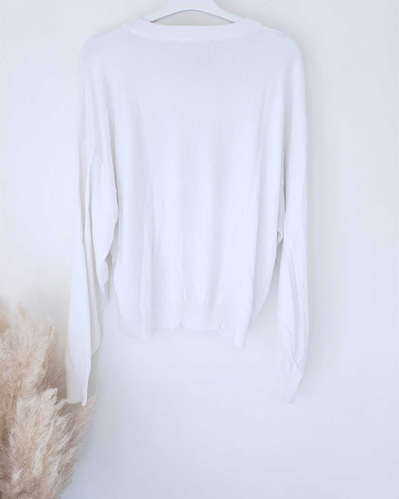 Pull blanc à sequins fuchsia